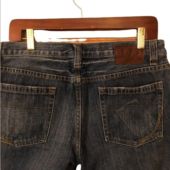 Distressed slim fit tapered jean - Picture 9 of 9